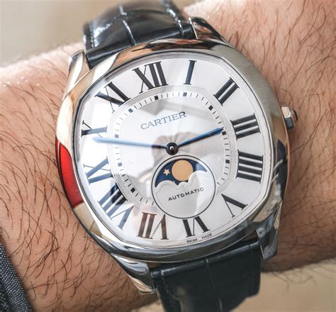 The Cartier Drive de Cartier Moon Phase watches hands